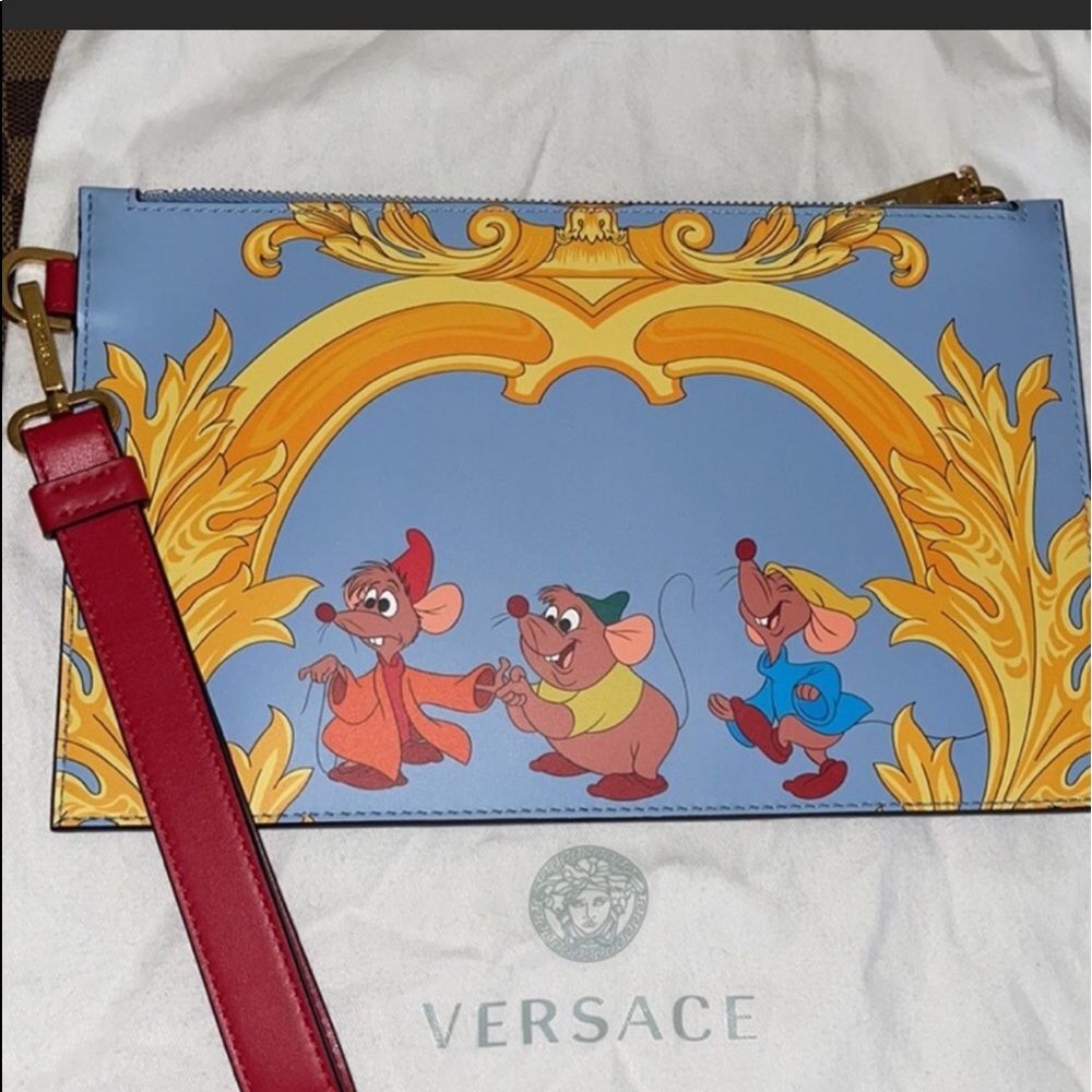 - Versace x Disney wristlet NWT last one in stores!!!!